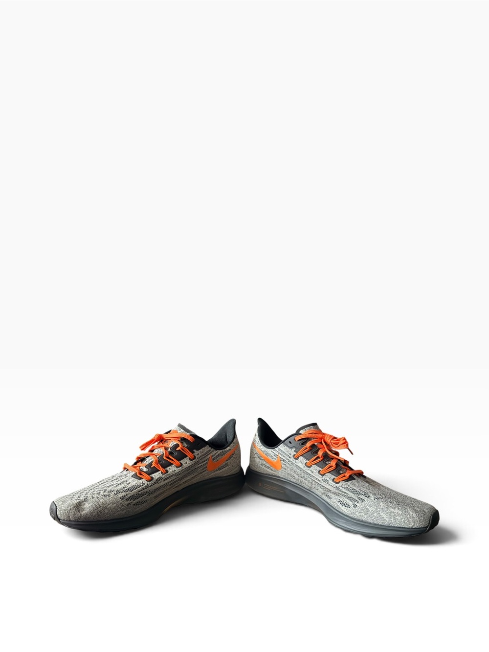 Nike Men’s Gray Running Sneakers with Orange Accents